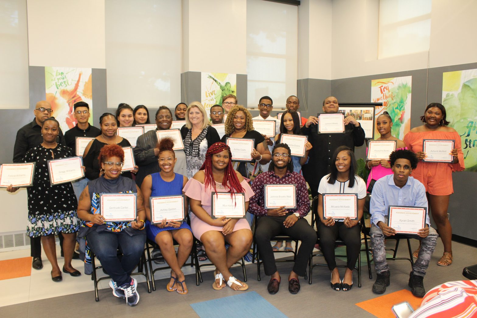 photo of Michaels scholars with their certificates